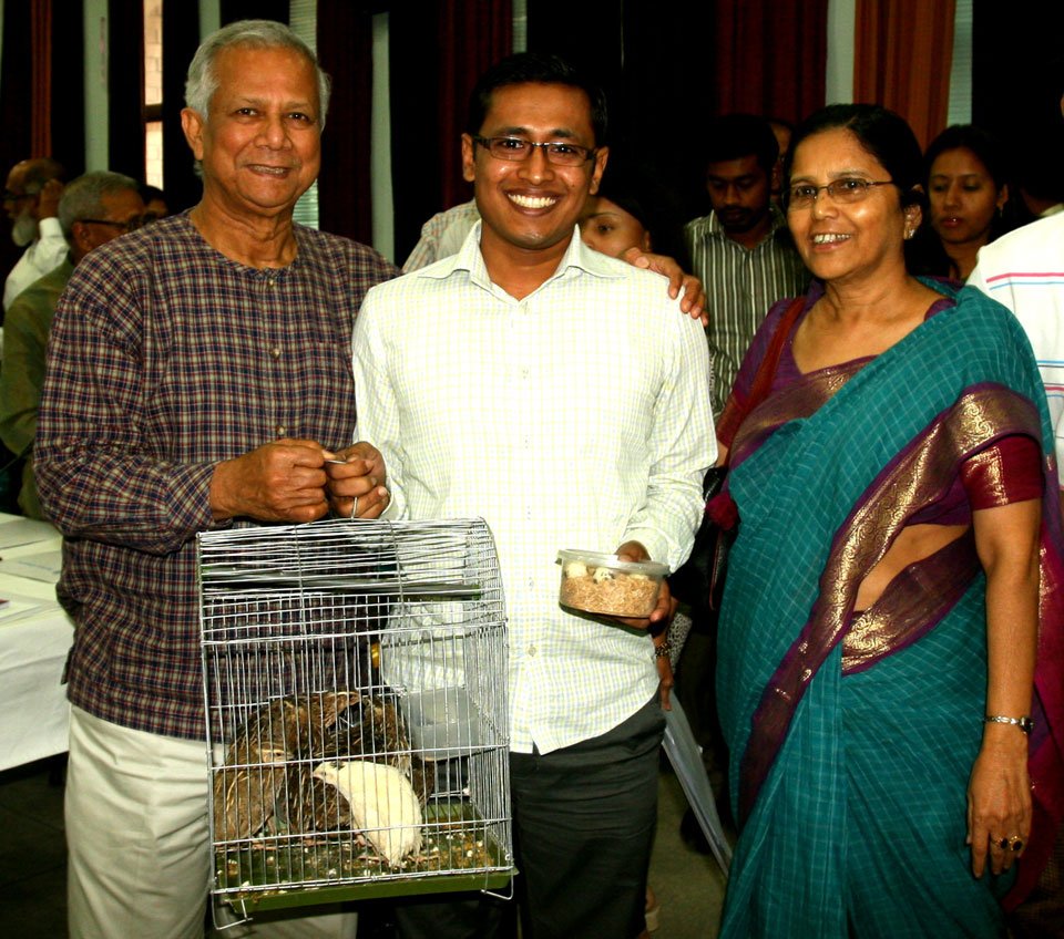 Md. Kamrul Hasan, a 28 year year old son of Grameen Bank borrower of 10 years, presented his business plan for setting up a quail bird hatchery at the 37th Design Lab. The Nobin Udyokta entrepreneur is seen in the photo with Nobel Laureate Professor Muhammad Yunus with his agro products.