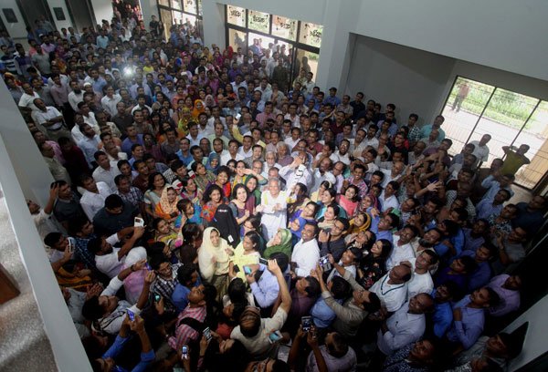 Yunus returns home among joyful colleagues holding Olympic Torch